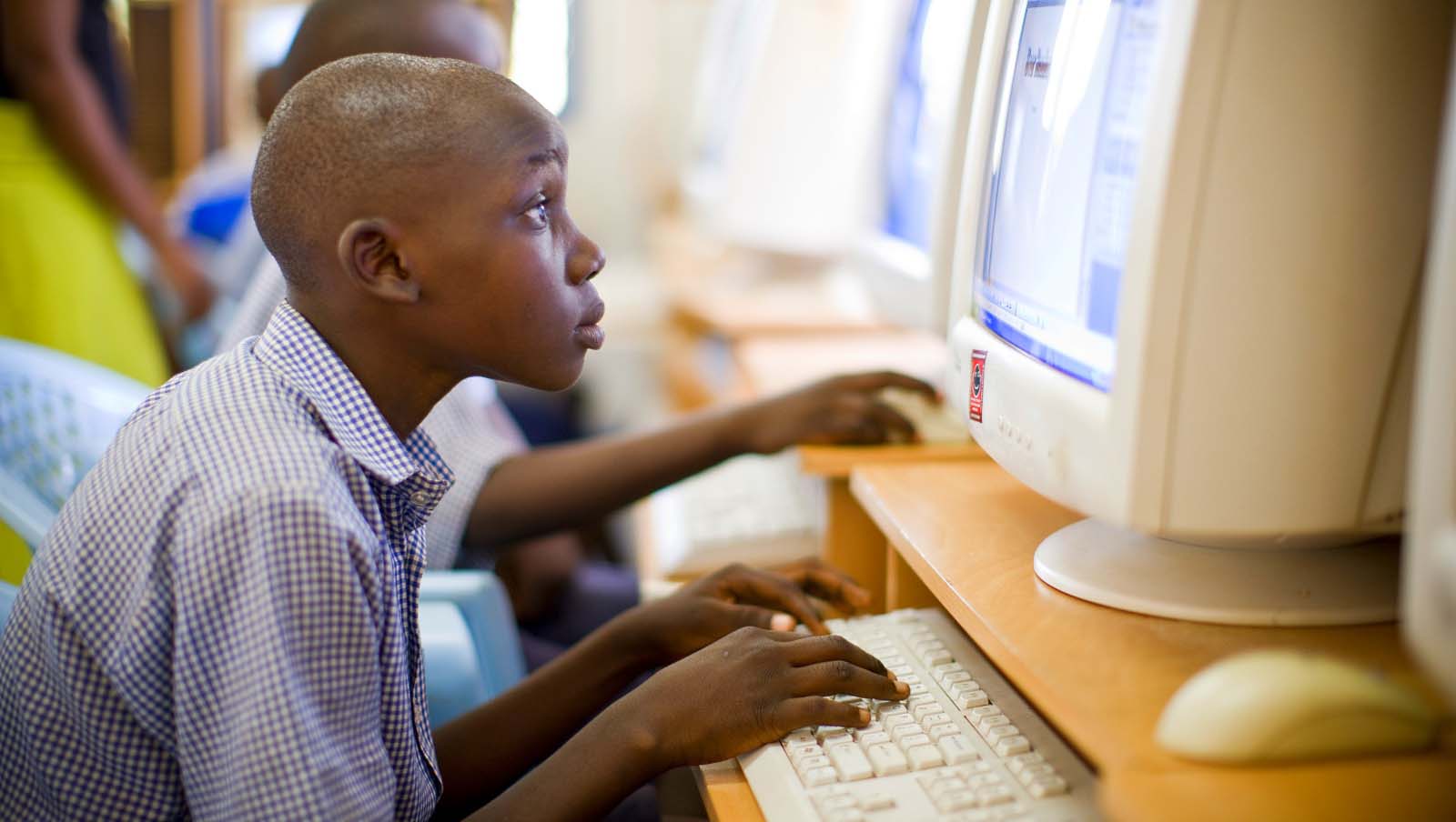 Student in Kenya using computer _blog.swaliafrica.com_