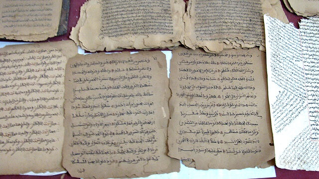 Timbuktu manuscripts being copied. - Leslie Lewis /Flickr